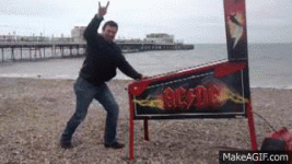 gif dan plays ACDC on the beach.gif